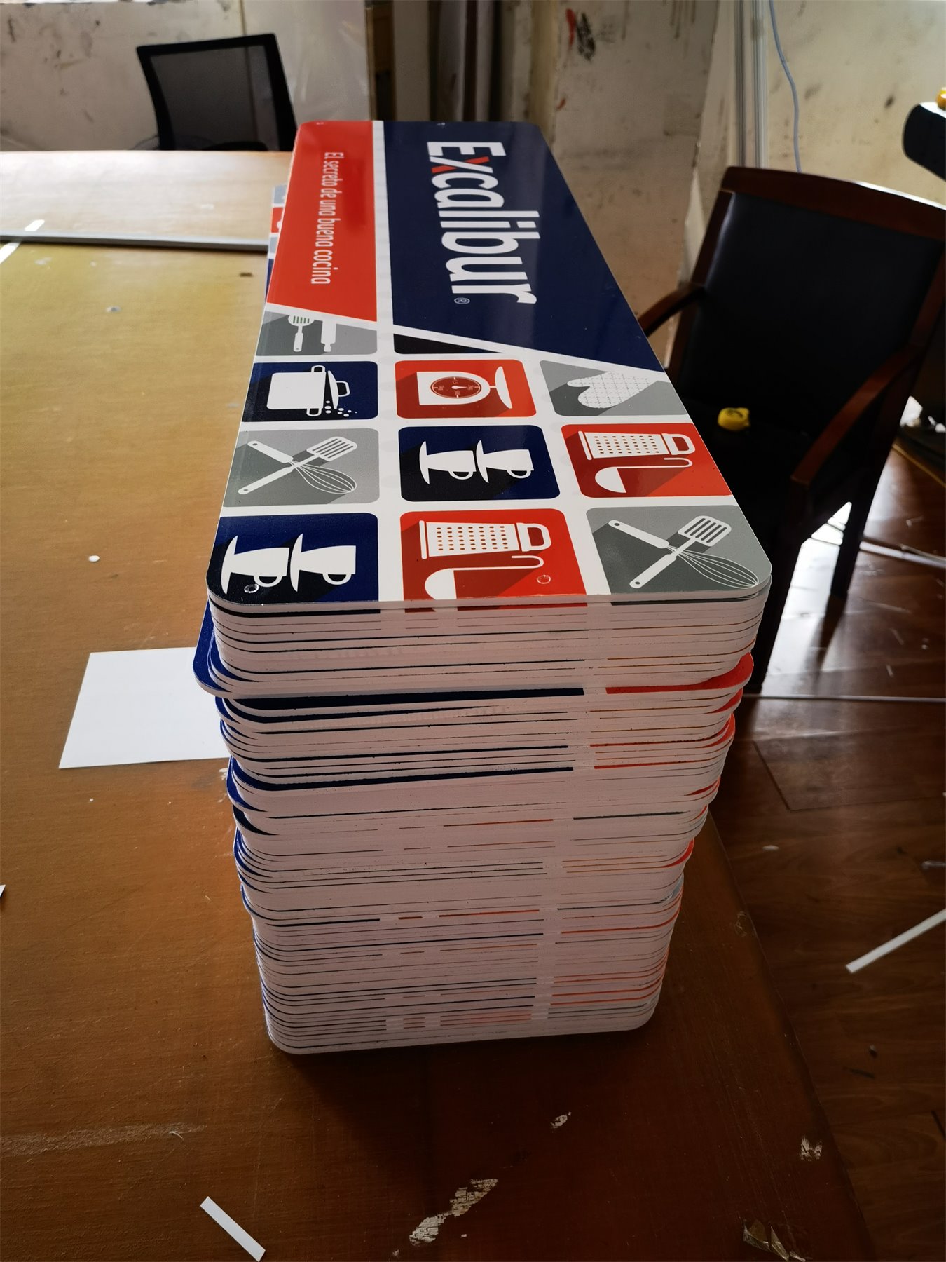 Stacked rigid sign boards after cutting